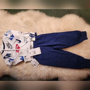 Nike child matching set for 12 month old boy. It is new.